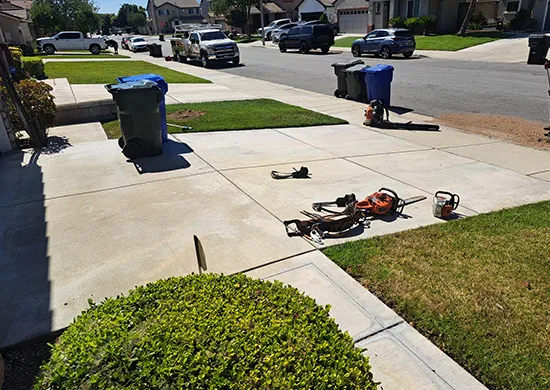 driveway with lawn equipment